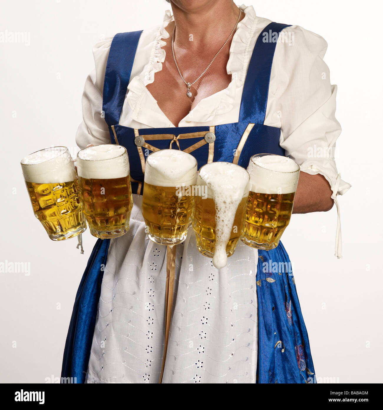 waitress WITH FIVE beer mugs, cut out, Muinch Bavaria GERMANY Europe Stock Photo