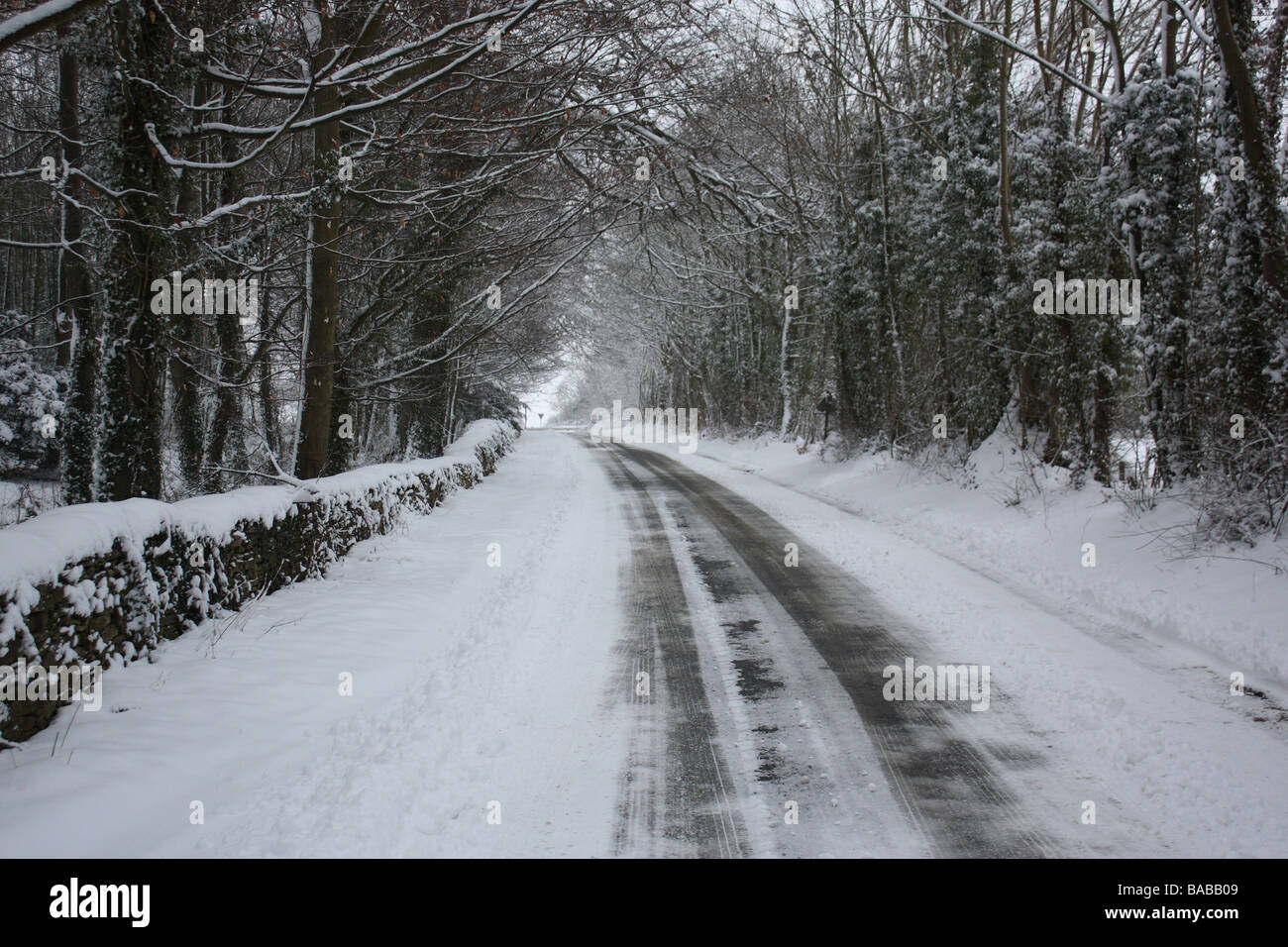 Snow covered village road. Stock Photo