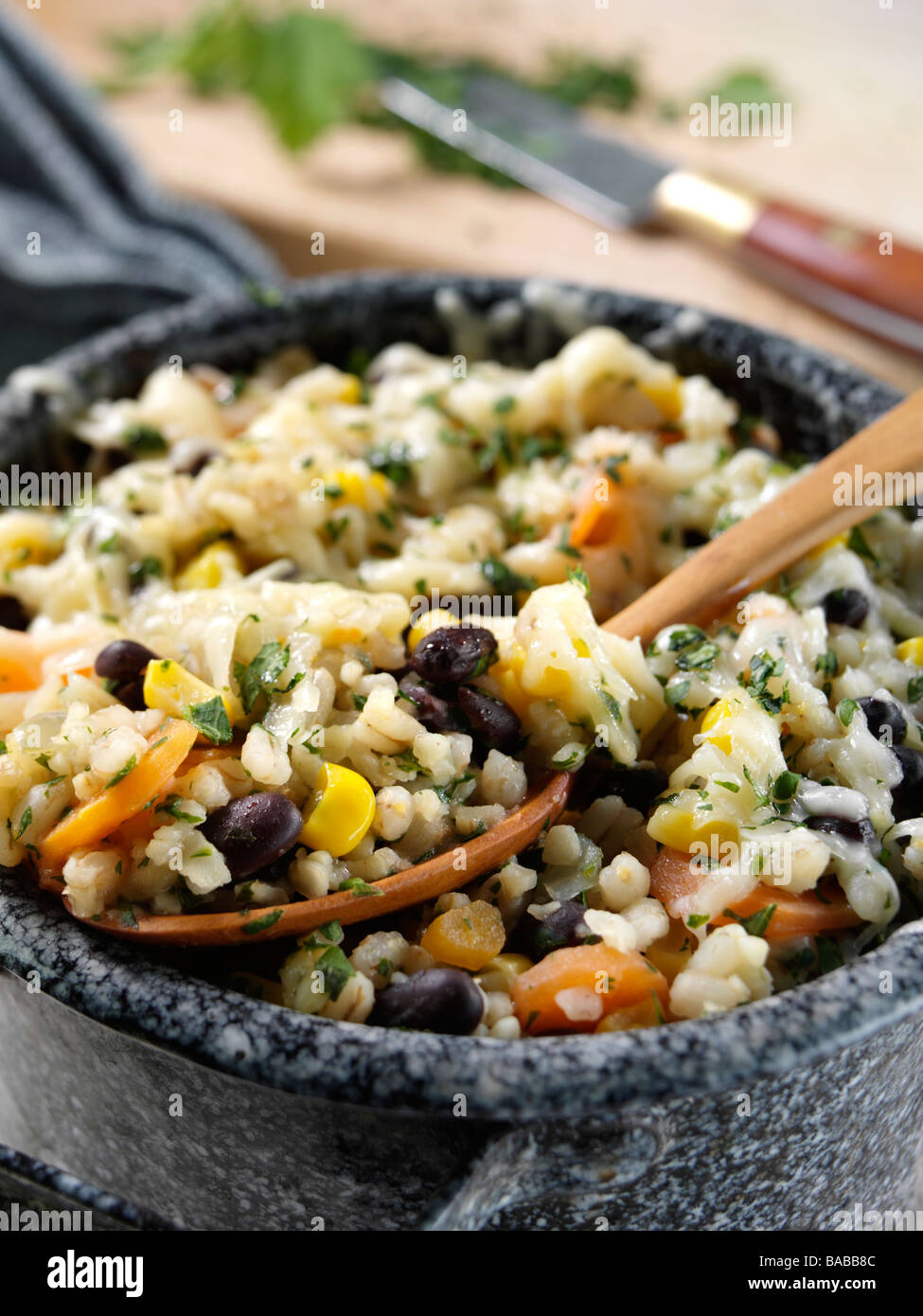 Vegetarian casserole with pearl barley bulgar wheat black beans carrots