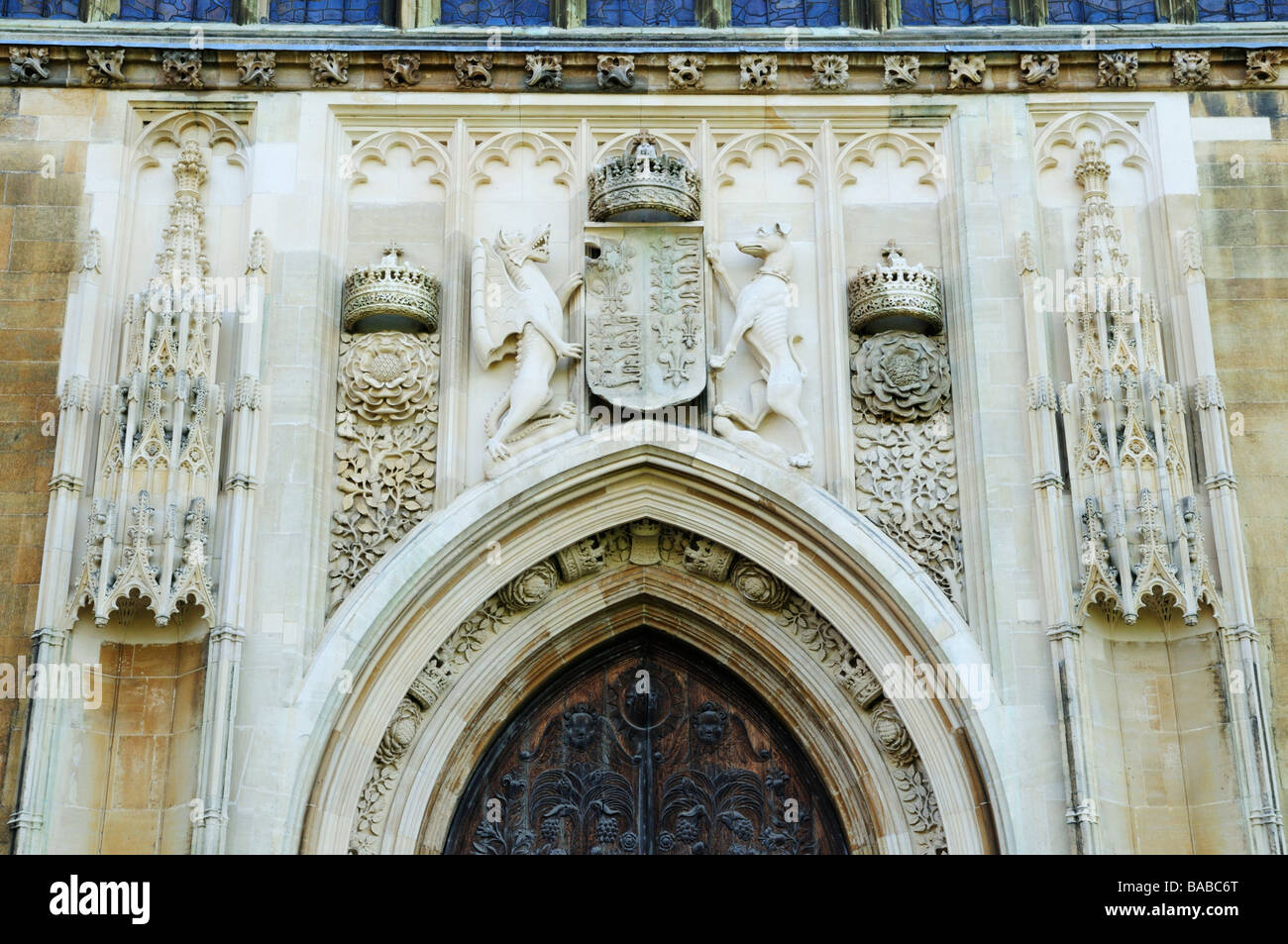 Detail of carvings above the west door of Kings College Chapel, cambridge England Uk Stock Photo