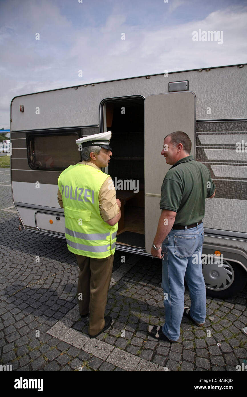 Highway patrol, a policeman controlling a travel trailer, Solingen, Germany Stock Photo