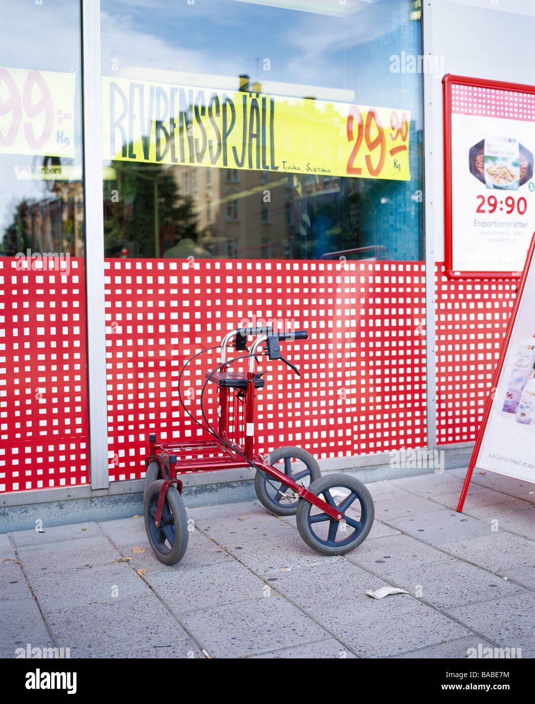 A walking frame outside a grocery store Sweden Stock Photo Alamy