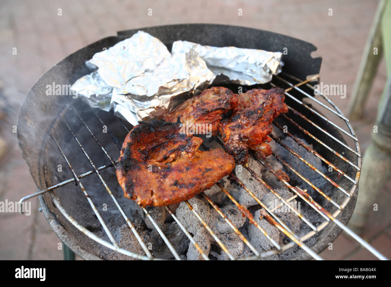 Meat on a barbecue grill, Kiel, Germany Stock Photo