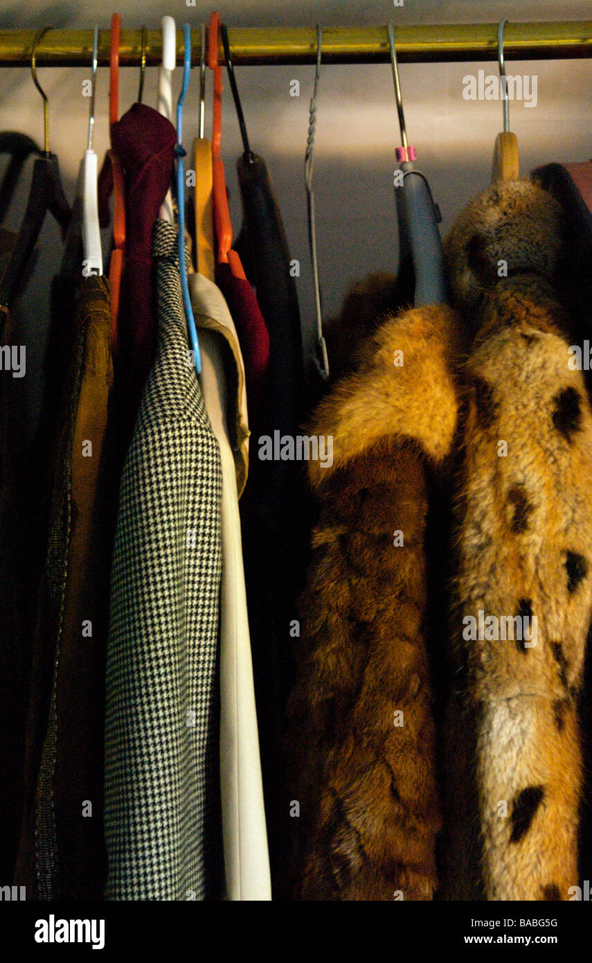 Coats hanging up home hi-res stock photography and images - Alamy