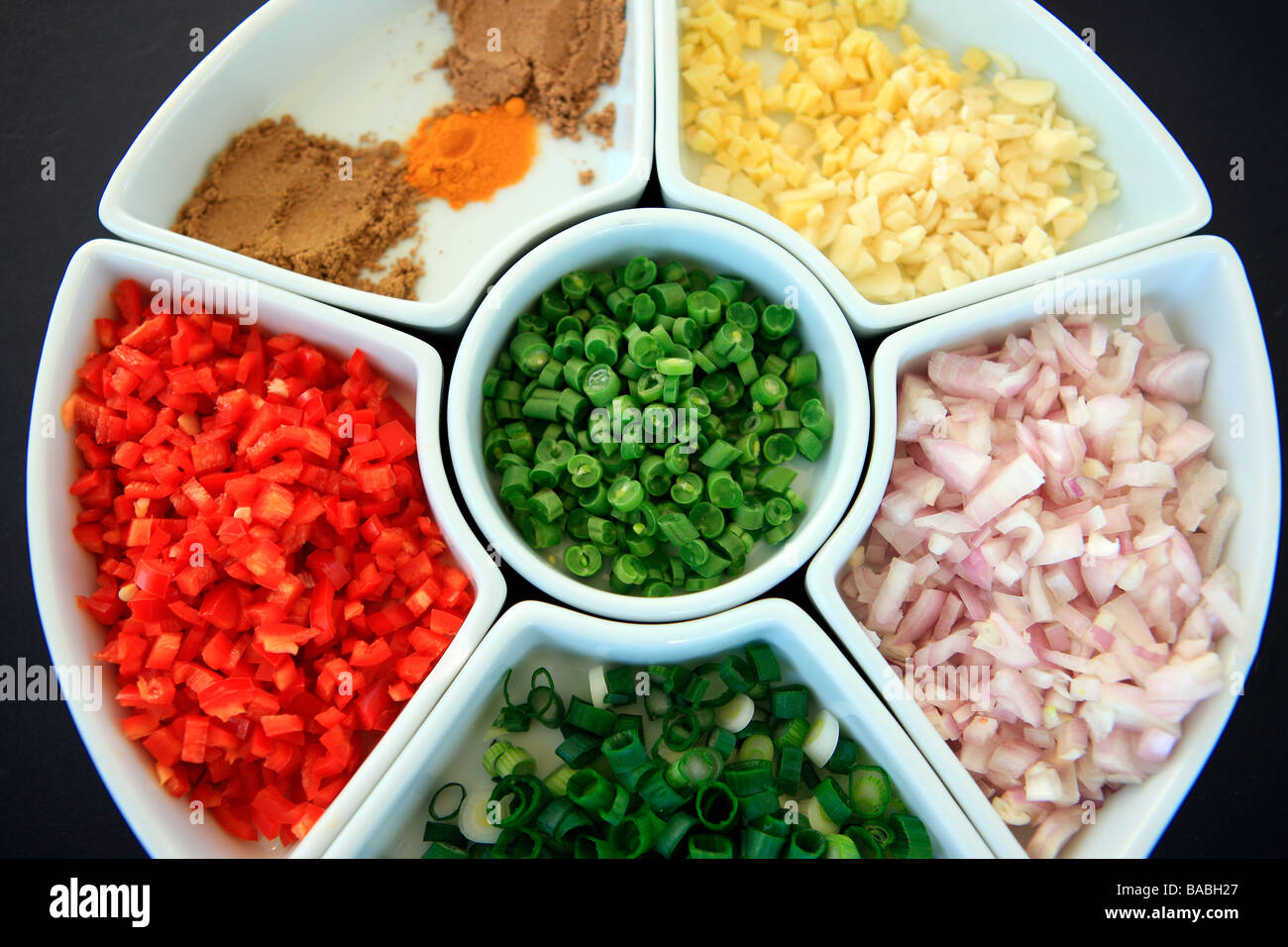 Freshly chopped vegetables in a 'lazy Susan' Stock Photo