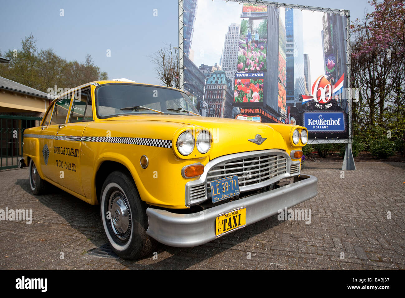 Yellow taxi cab on display. Stock Photo