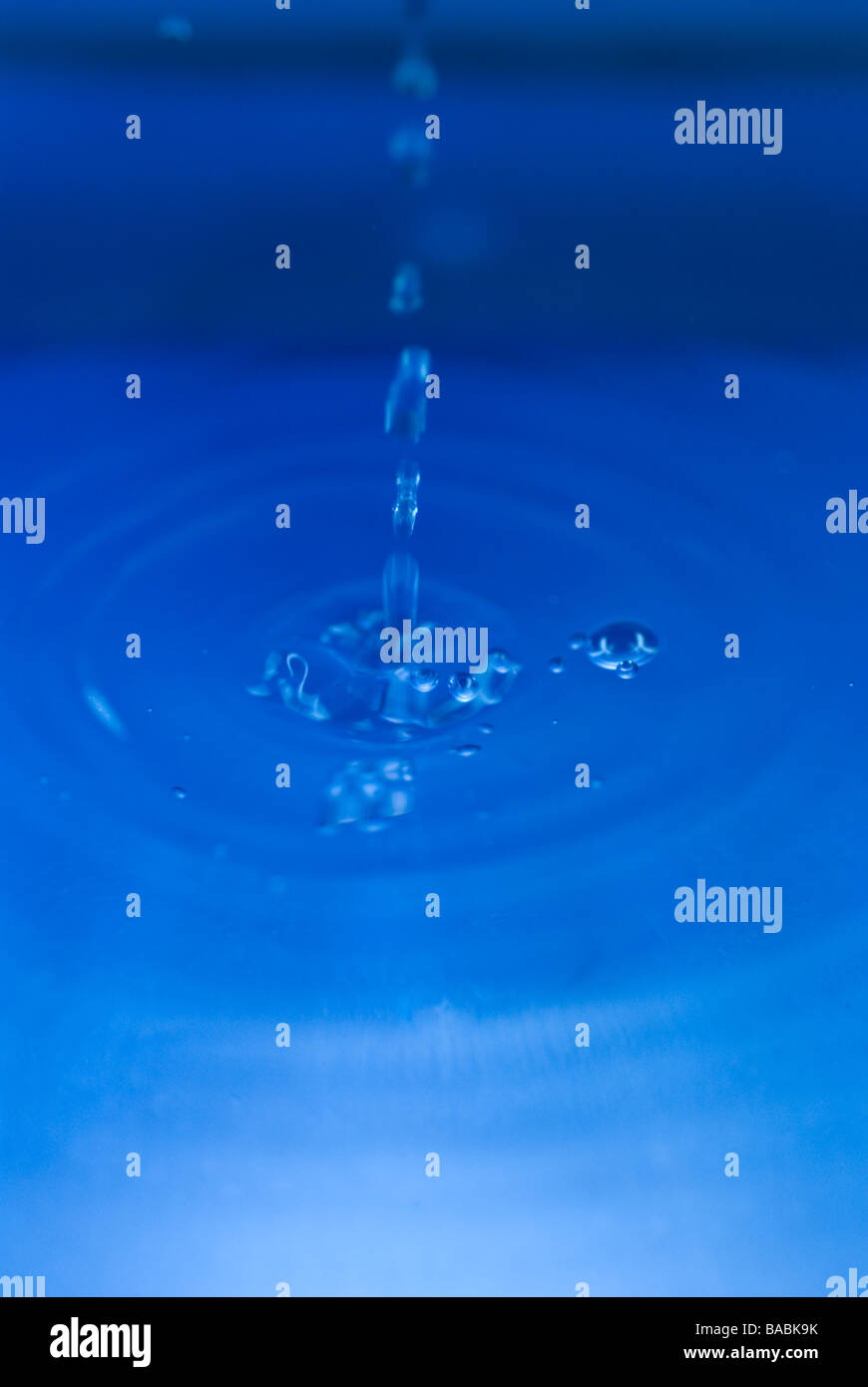 blue water drops falling Stock Photo