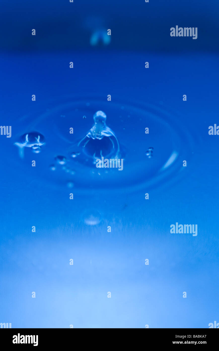 blue water drops falling Stock Photo