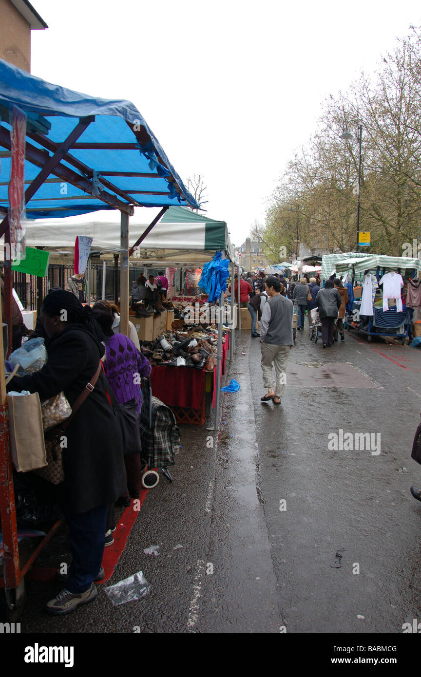 Vendors and Shoppers at East st market in Walworth, London, England, Uk