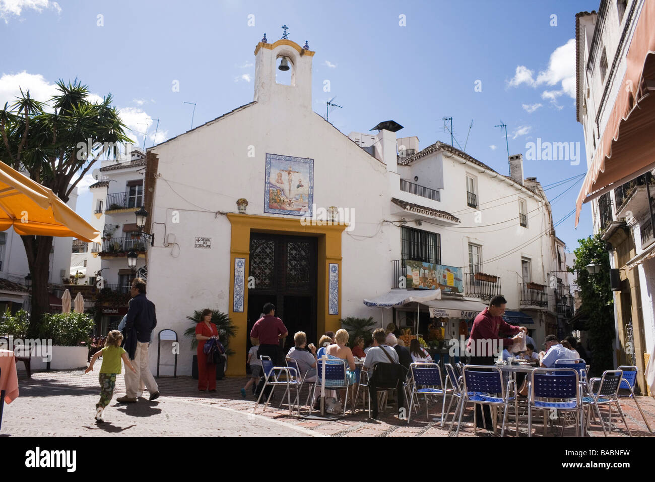 Marbella Malaga Province Costa del Sol Spain Tourists enjoying the sunshine in the Orange Square in the old town Stock Photo