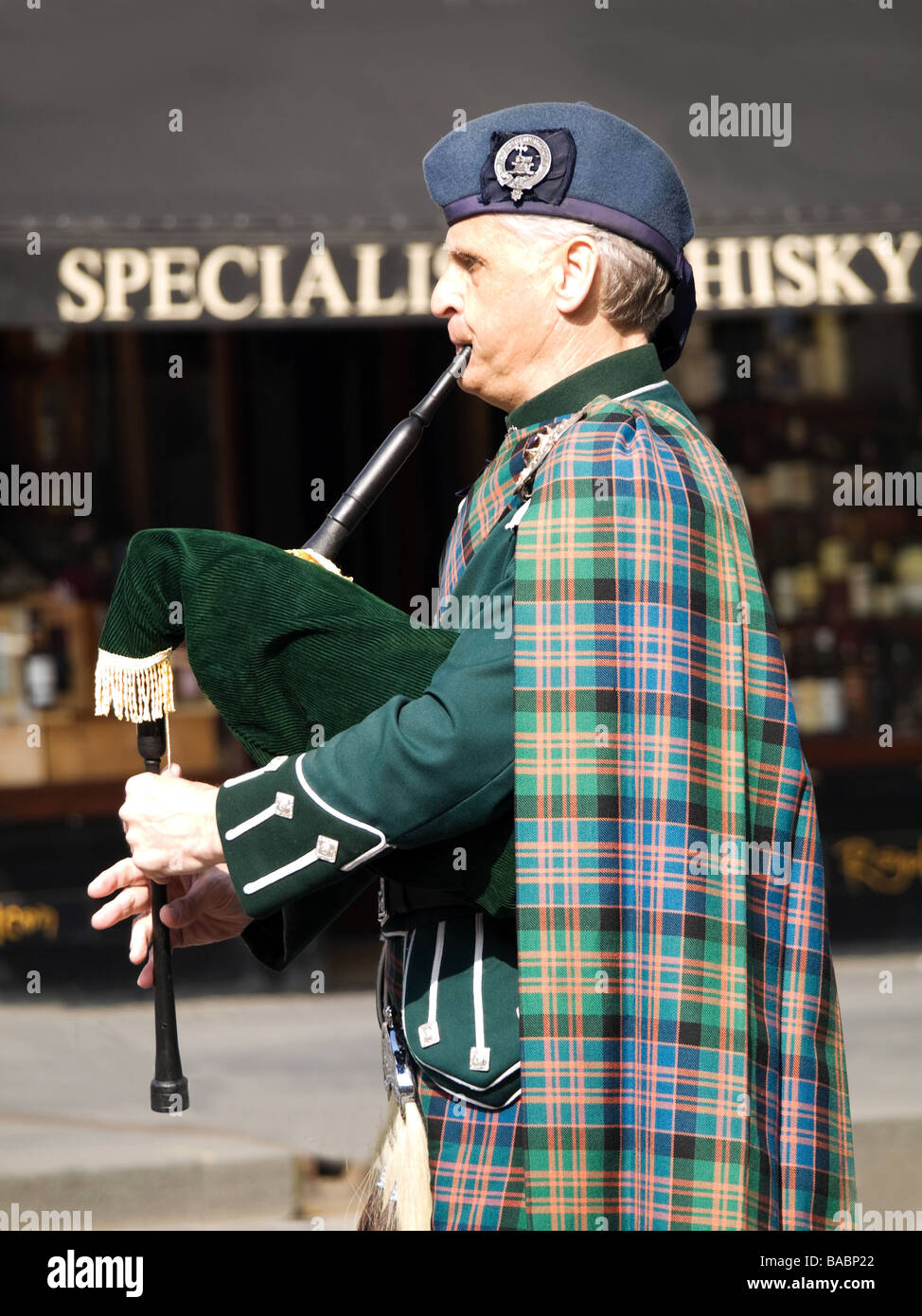 Scottish bagpipe performer in the city of Edinburgh Scotland Stock Photo