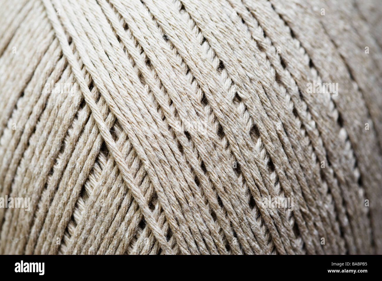 Close up of a ball of natural colored cotton yarn/twine. Stock Photo