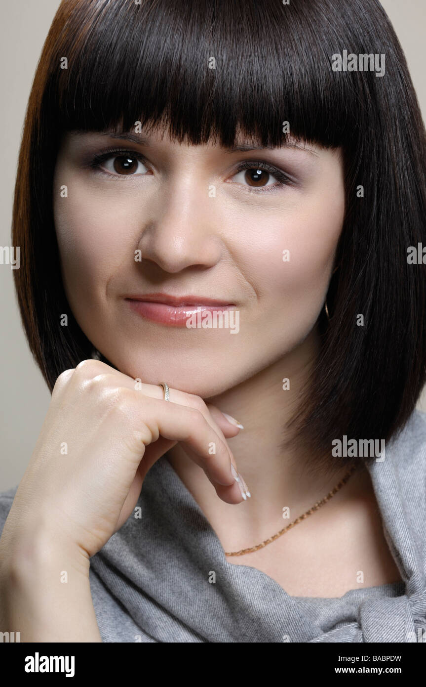 Portrait of smiling young businesswoman Stock Photo - Alamy