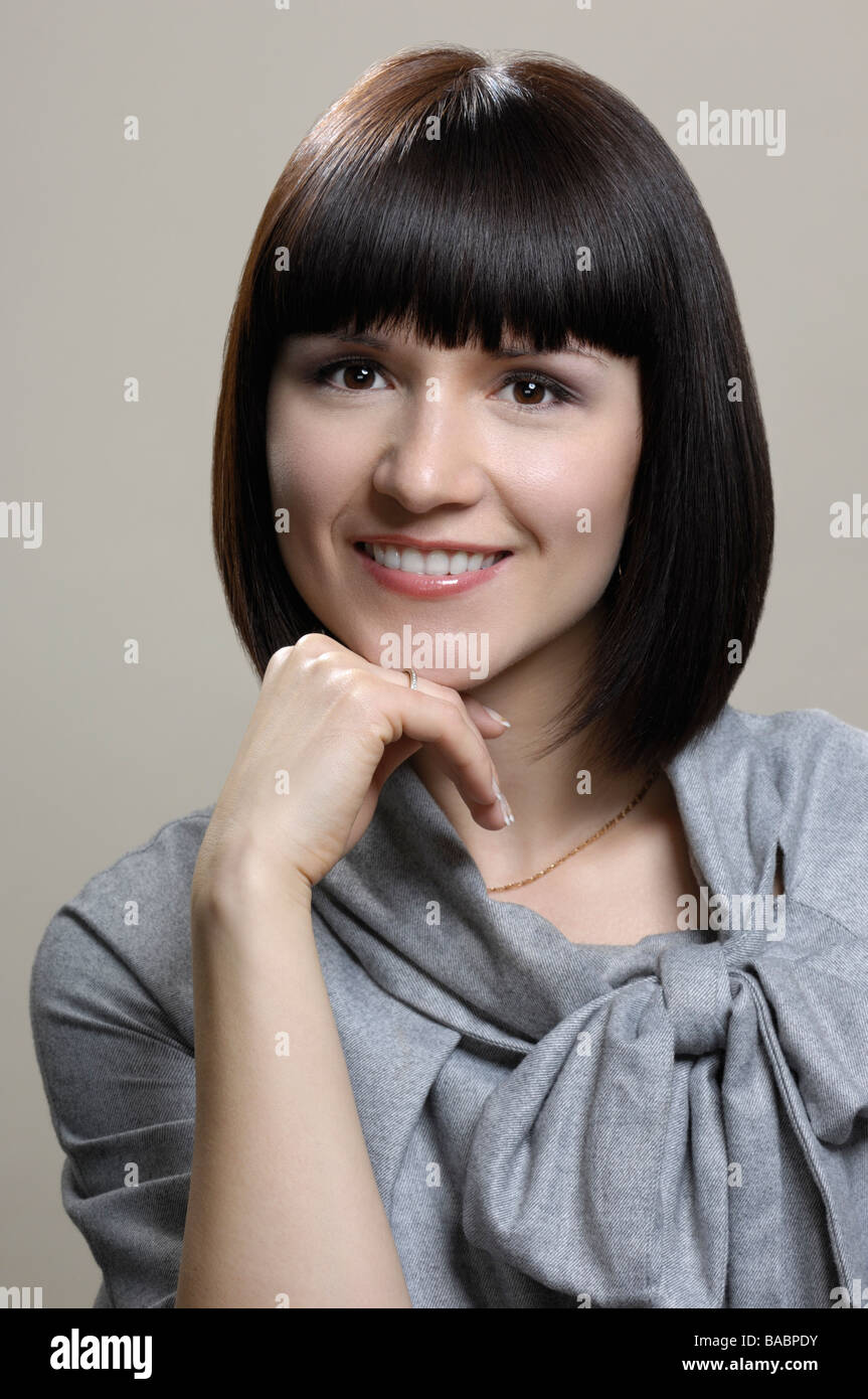 Portrait of smiling young businesswoman Stock Photo
