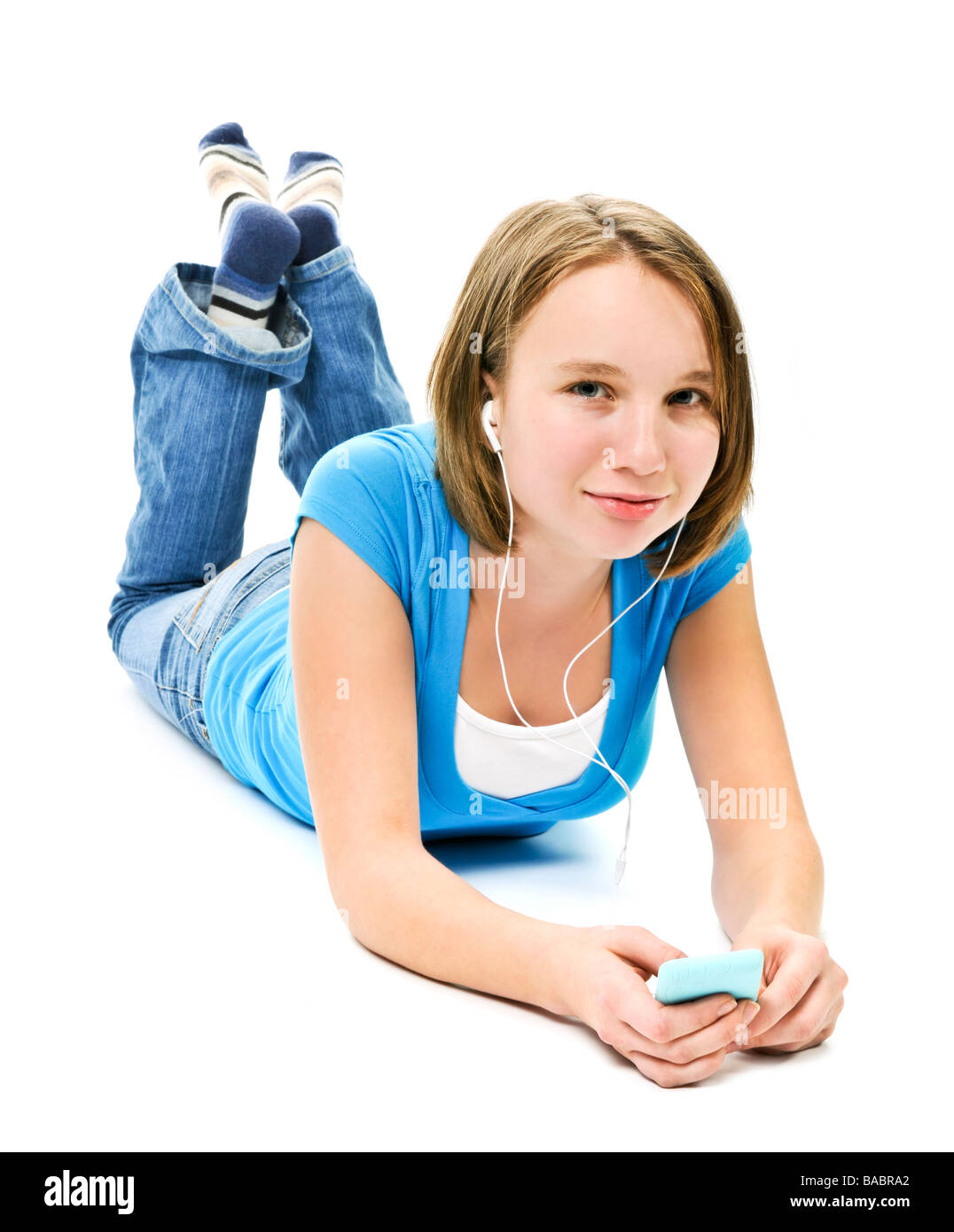 Teenage girl listening to music with her mp3 player Stock Photo Alamy