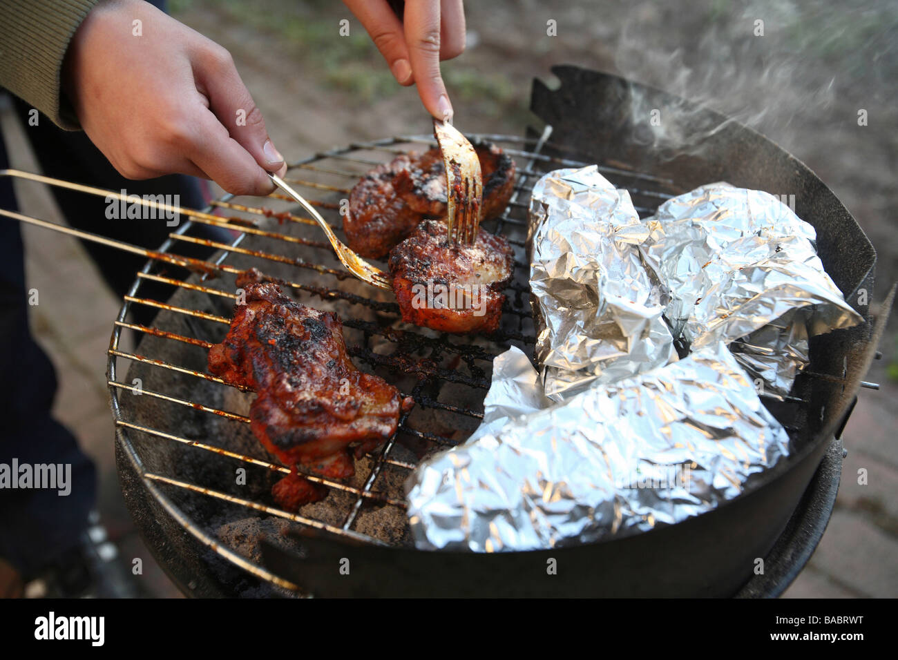 Meat on a barbecue grill, Kiel, Germany Stock Photo - Alamy