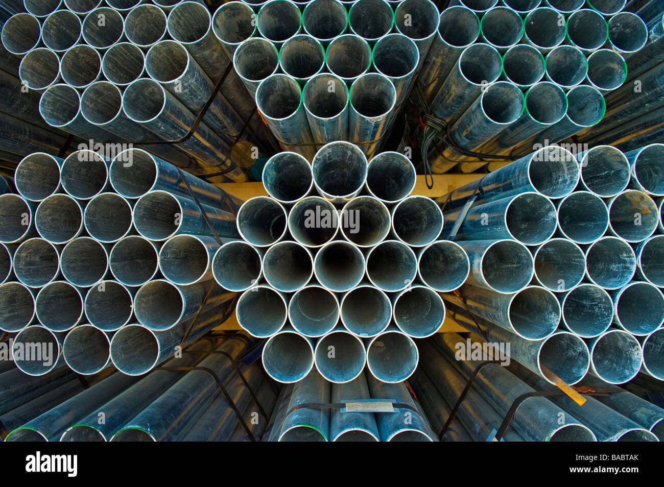 pipework plumbing iron steel tube pipe duct tubes in mill lengths sell seller stor storage industry trade tarding commerce traff Stock Photo