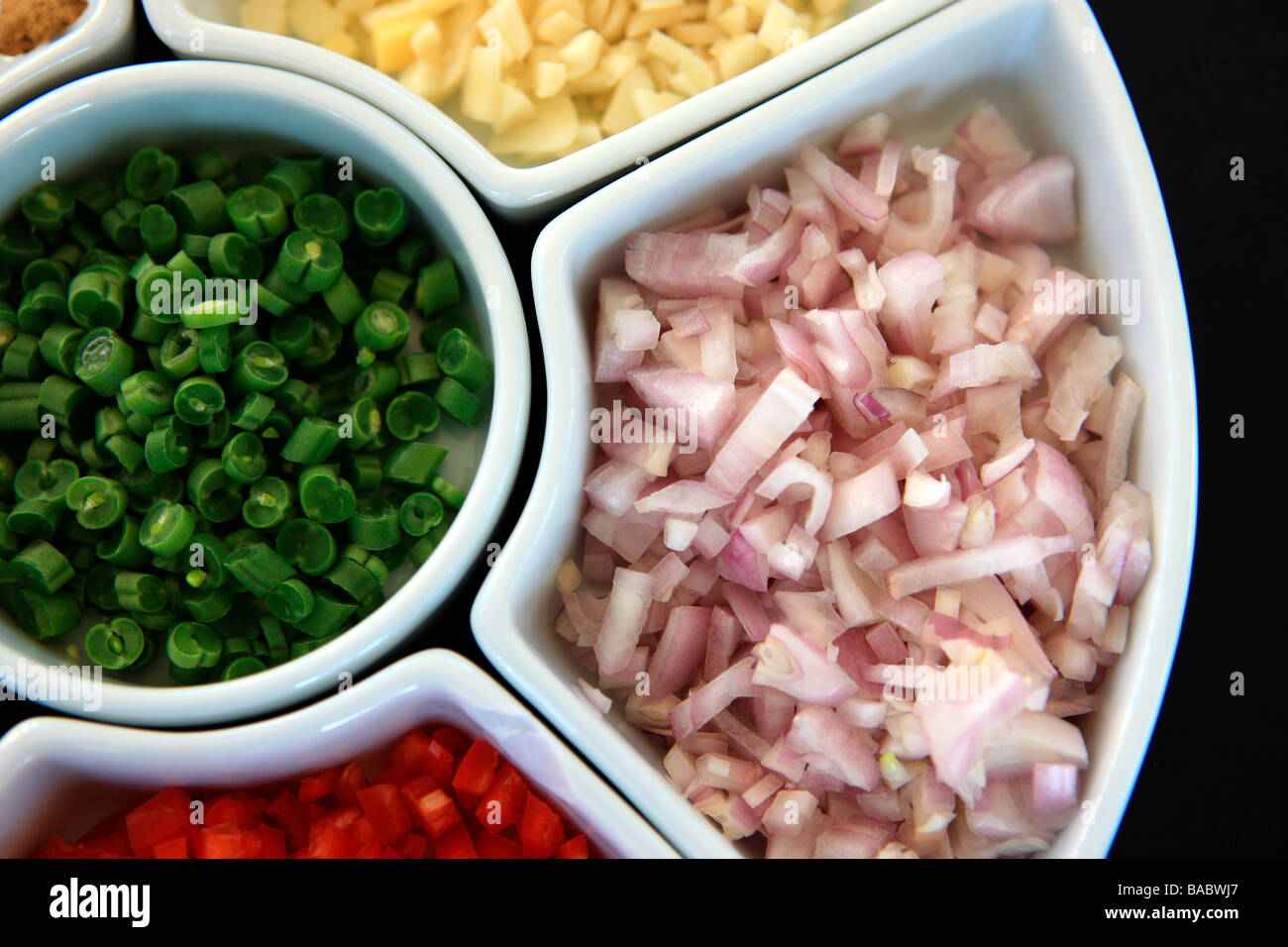 chopped vegetables in a 'lazy Susan' ready to be used in cooking Stock Photo
