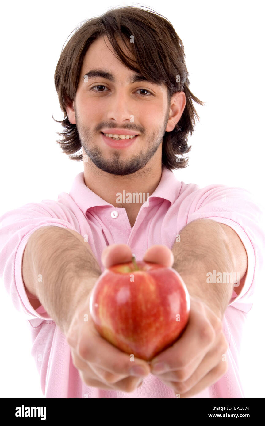 young man showing apple Stock Photo