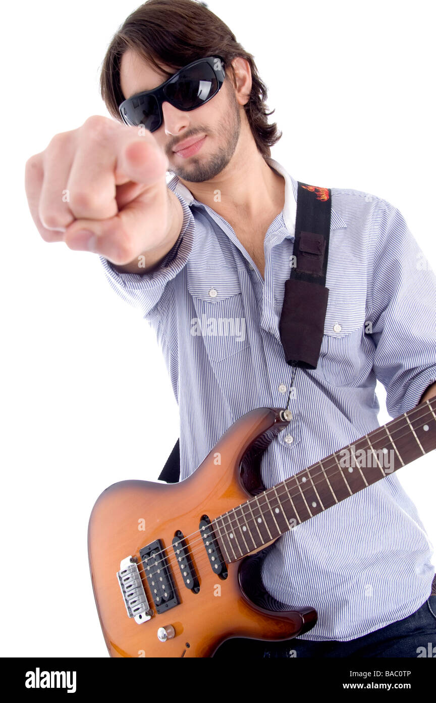 young rock star posing with guitar Stock Photo - Alamy