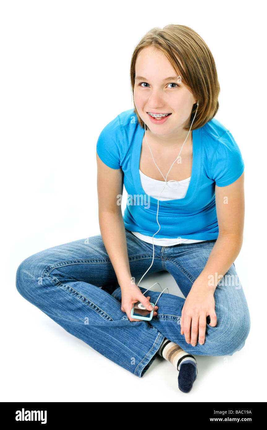 Teenage girl listening to music with her mp3 player Stock Photo Alamy
