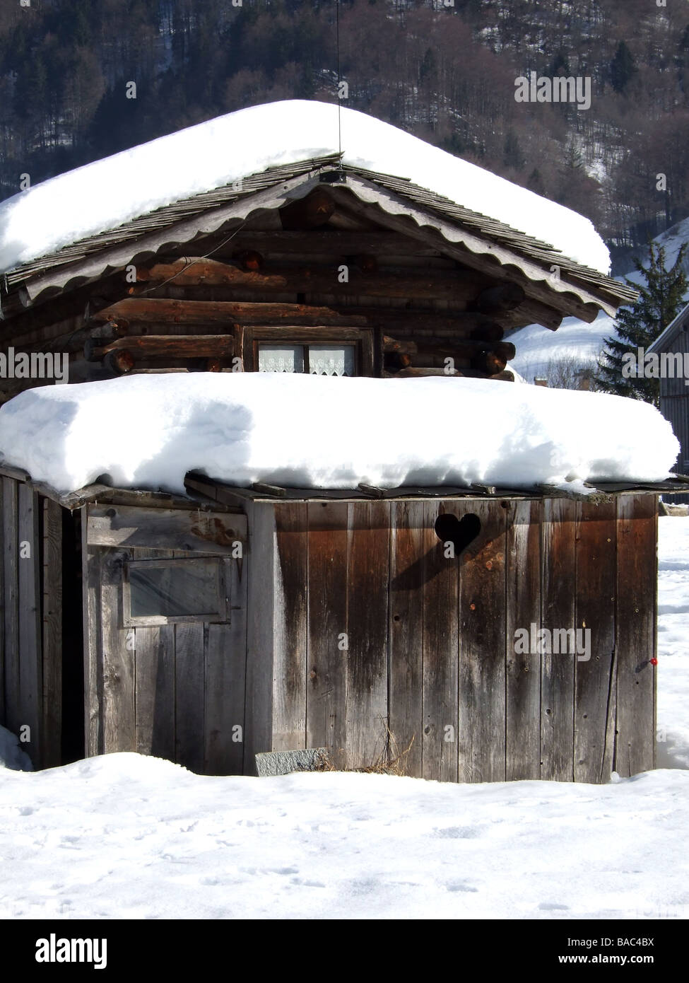 loo on a winter hiking trail in the Bregenz Forest Stock Photo