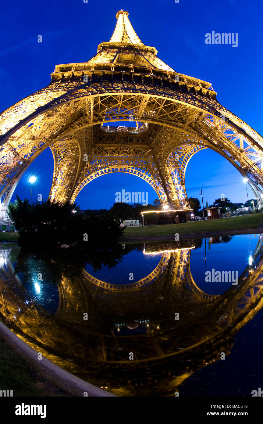France, Paris, the Eiffel tower illuminated (lightning of the Eiffel tower by Pierre Bideau, reproduction rights) Stock Photo