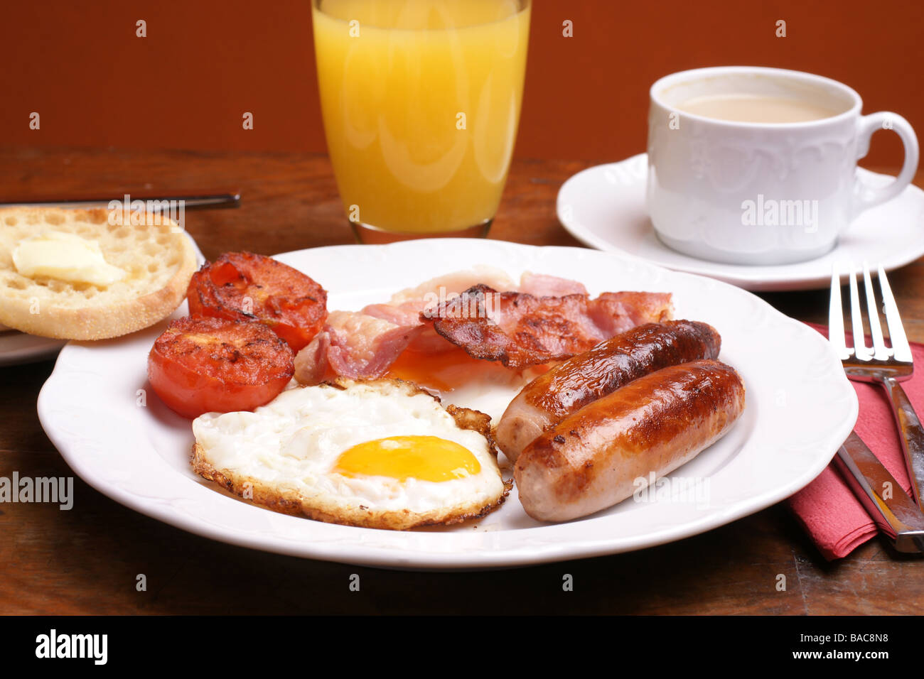 Freshly cooked breakfast with sausages and juice Stock Photo Alamy