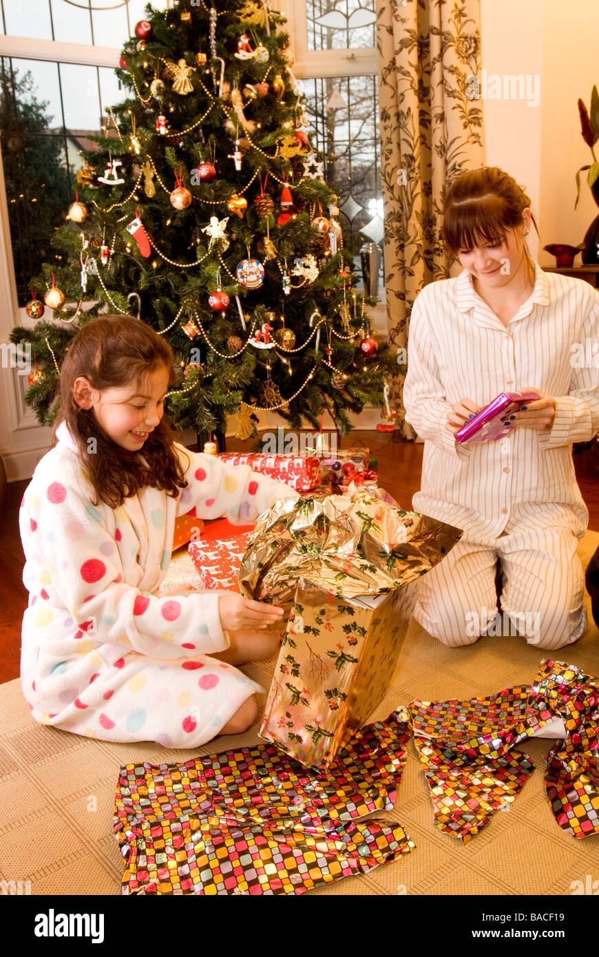 Teenage Girl Opening Christmas Presents High Resolution Stock Photography And Images Alamy