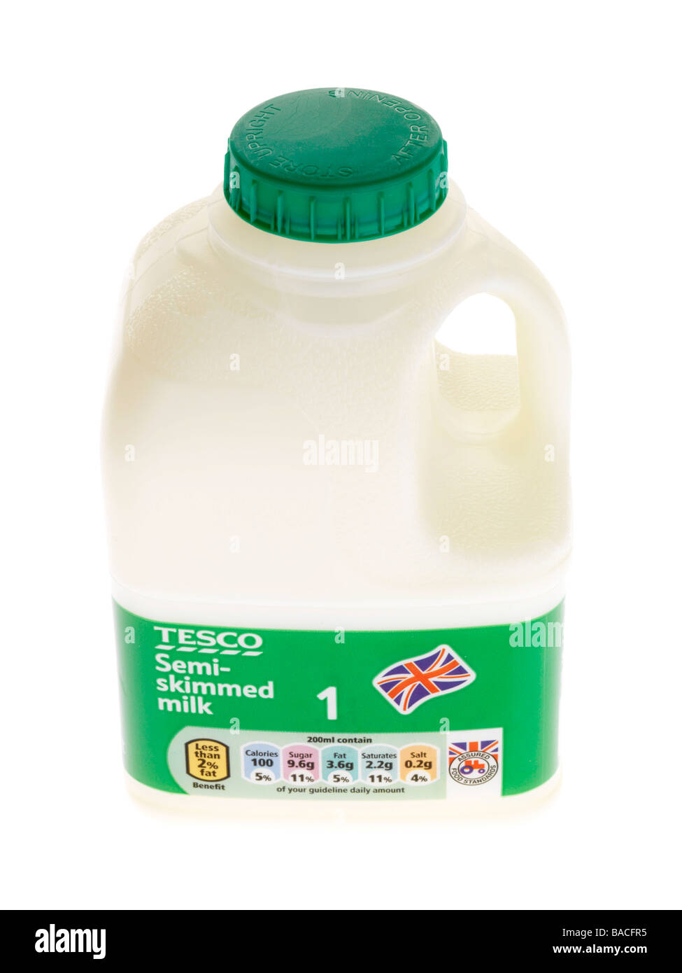 Tesco Branded Plastic Pint Bottle Of Semi Skimmed Milk Isolated Against A White Background With No People And A Clipping Path Stock Photo