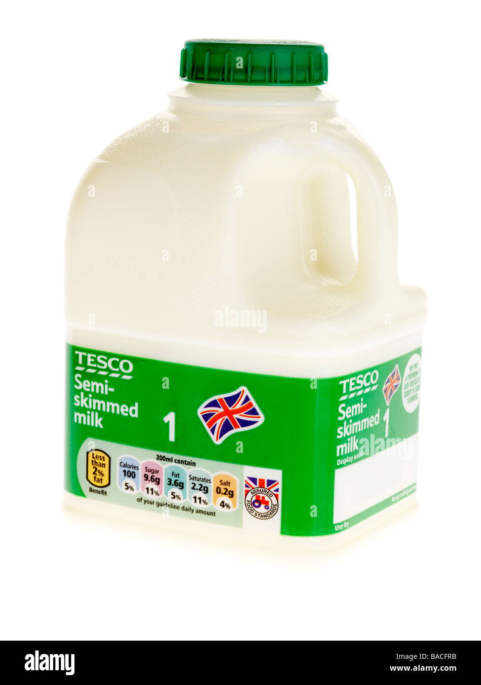 Tesco Branded Plastic Pint Bottle Of Semi Skimmed Milk Isolated Against A White Background With No People And A Clipping Path Stock Photo