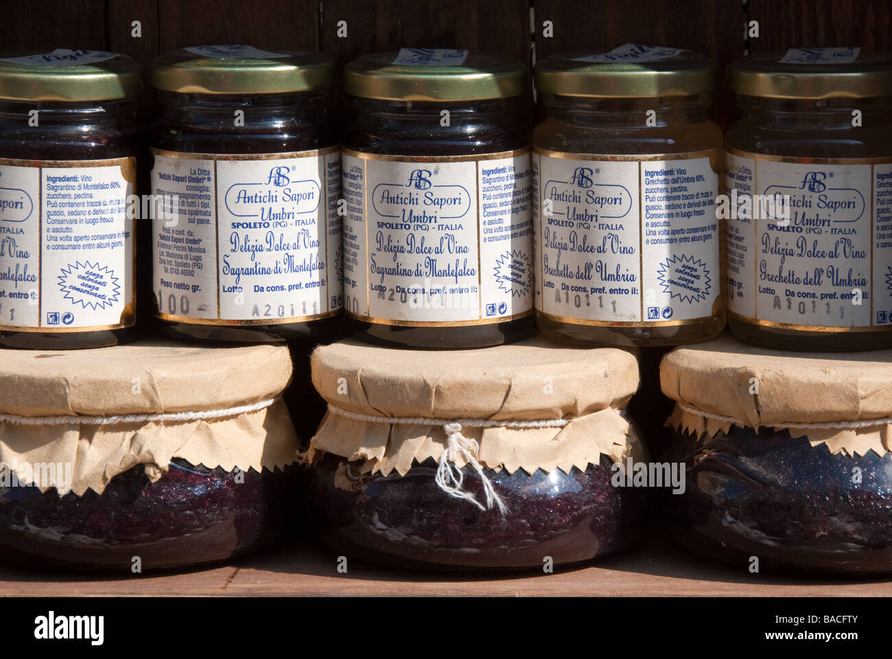 Umbrian relishes on sale in the weekly food market at Umbertide Umbria Stock Photo