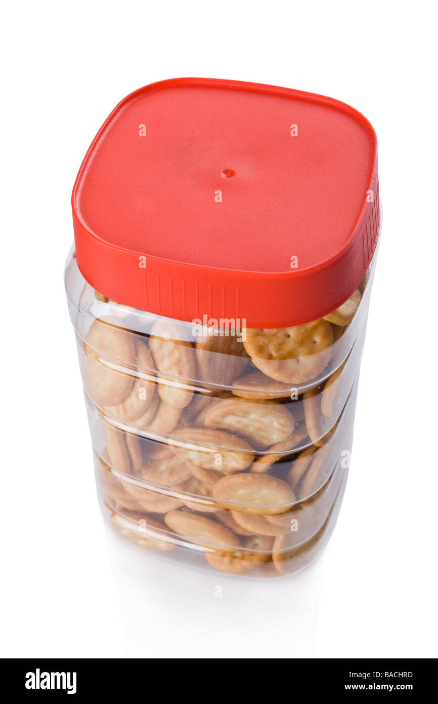 Jar of small appetizer crackers isolated on white Stock Photo