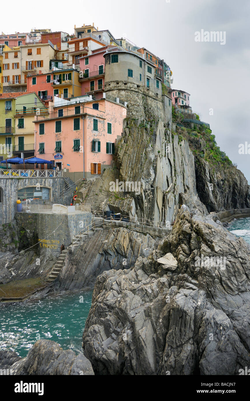 The houses on the steep cliffs above the harbor in Manarola, Cinque