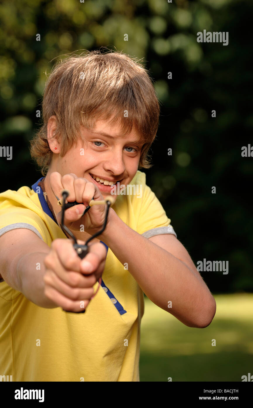 Boy with a capapult Stock Photo