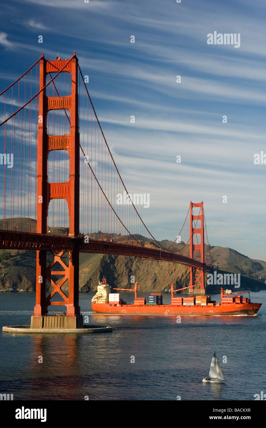 Cargo ship passes under the Golden Gate Bridge in San Francisco, USA Stock Photo