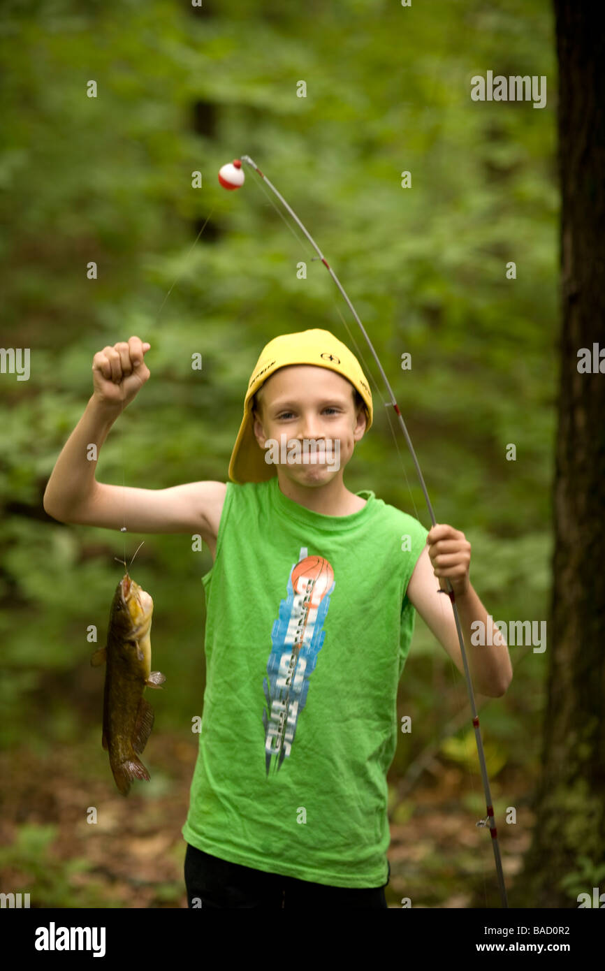 Boy holding catfish Stock Photo