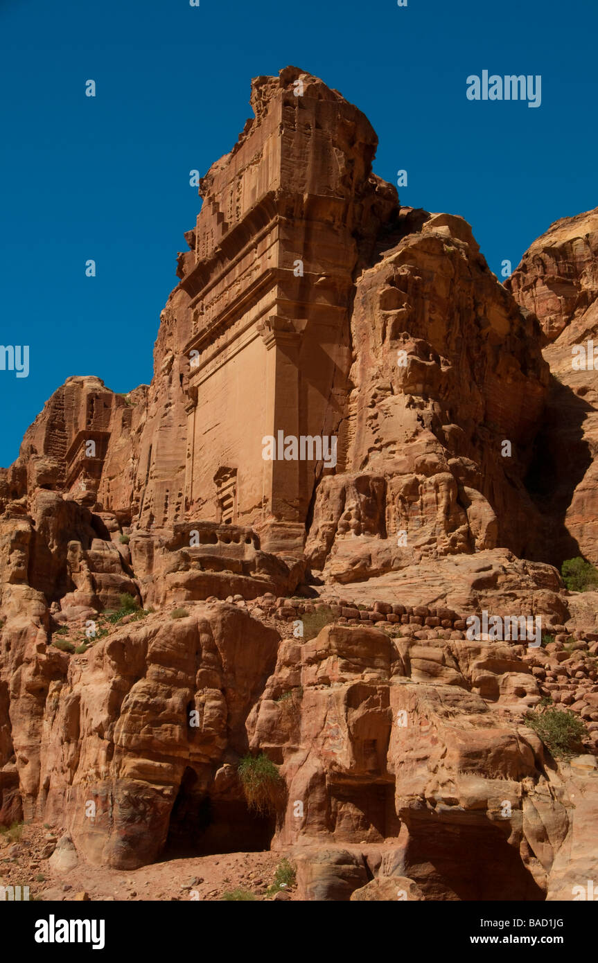 The Aneisho rock cut Tomb carved into a cliff face in the ancient Nabatean city of Petra Jordan Stock Photo