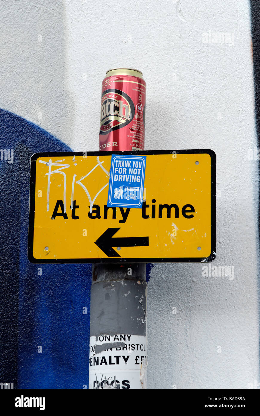 Litter in the UK. beer can left on top of post Stock Photo