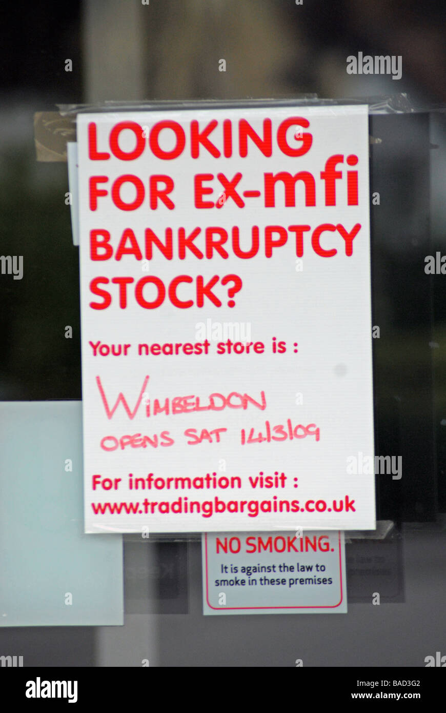 A poster offering bankruptcy stock at a closed MFI store in Kingston Upon Thames Greater London UK Stock Photo