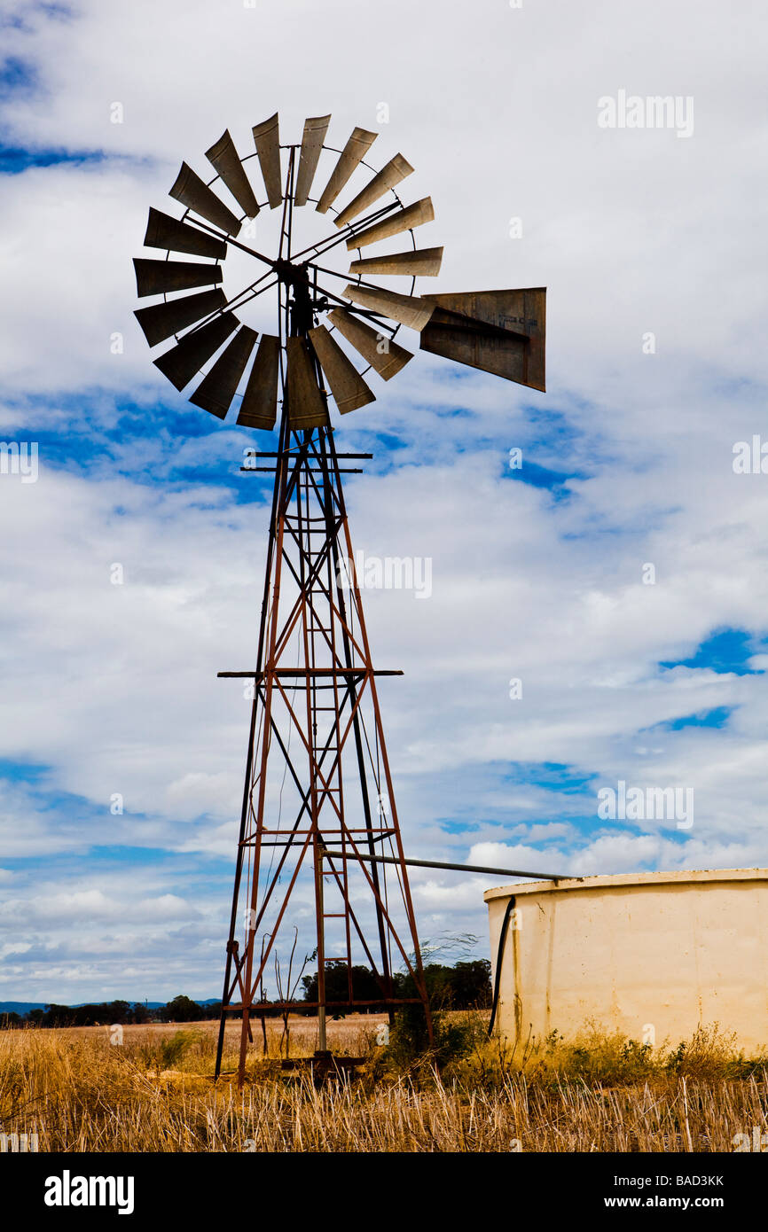A windmill and water storage tank The windmills pump water from