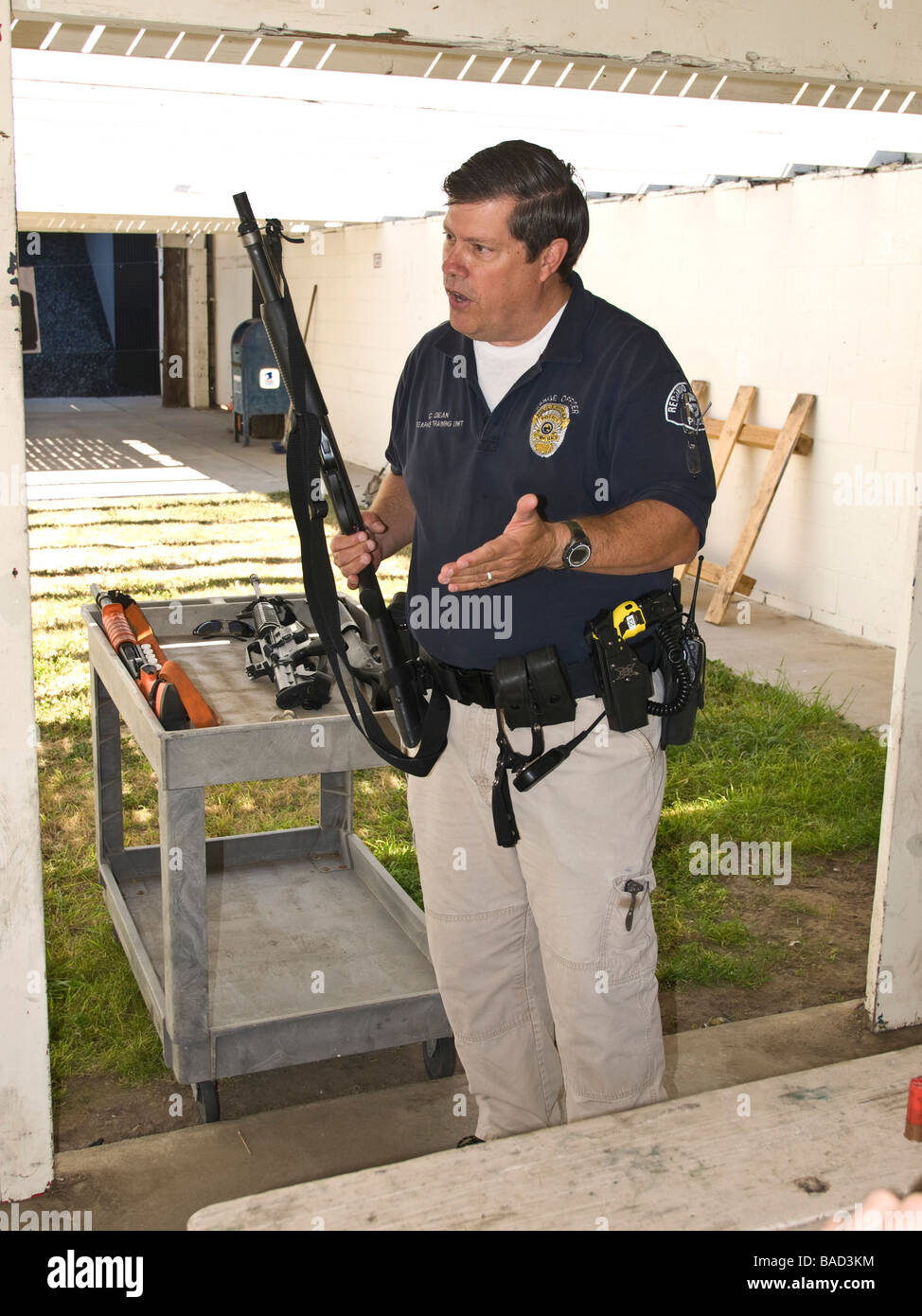 Range officer explains nomenclature and functioning of the Remington 12