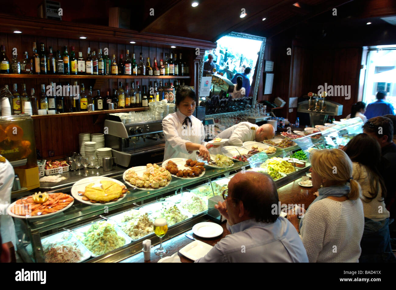 People eating in a Tapas bar Stock Photo
