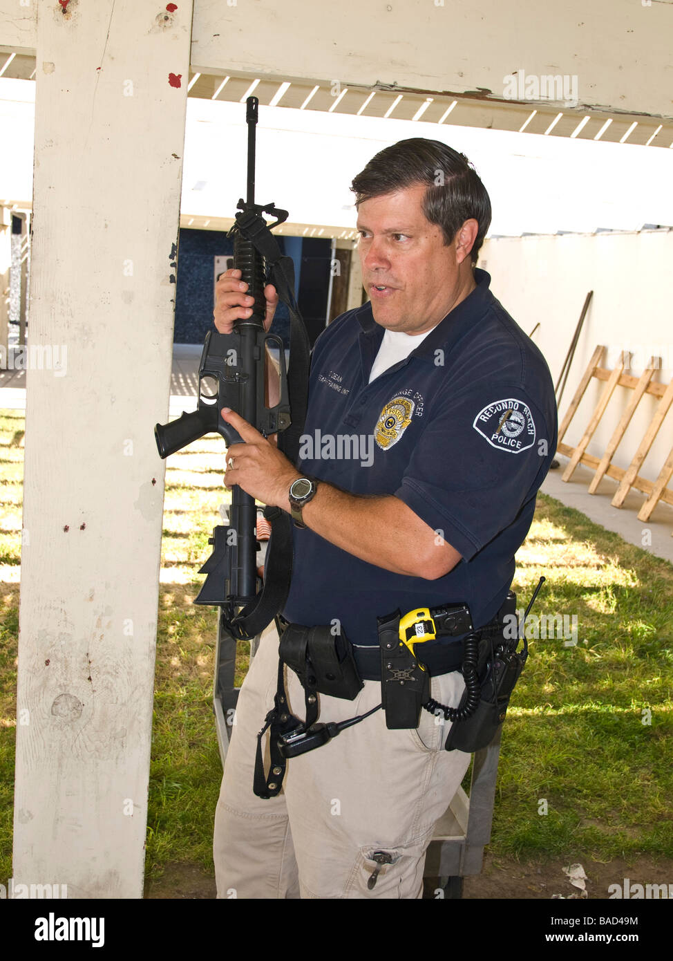 Range officer explains the nomenclature and functioning of the AR15 to