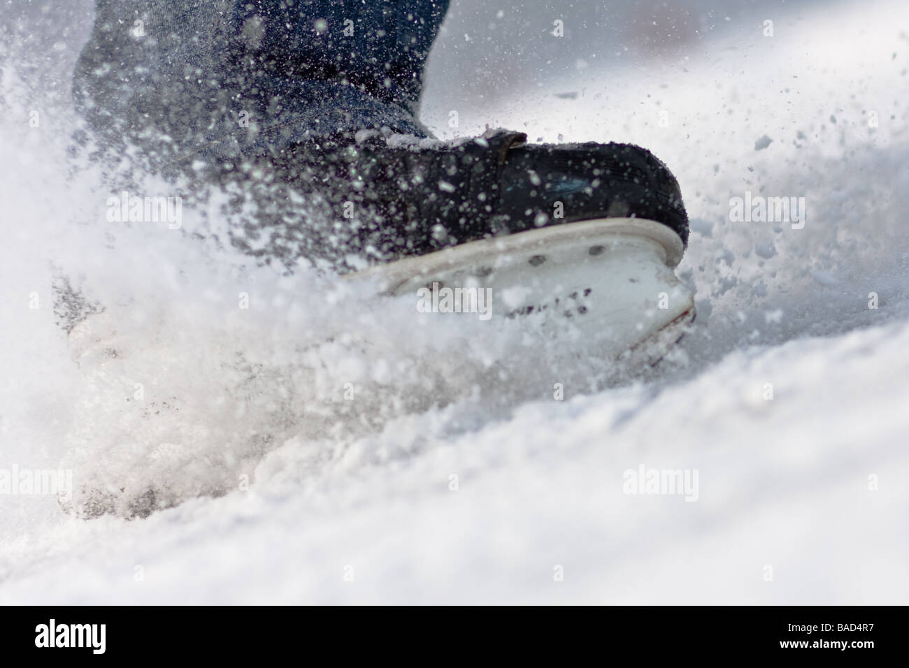 Aggressive breaking skates on ice Stock Photo Alamy