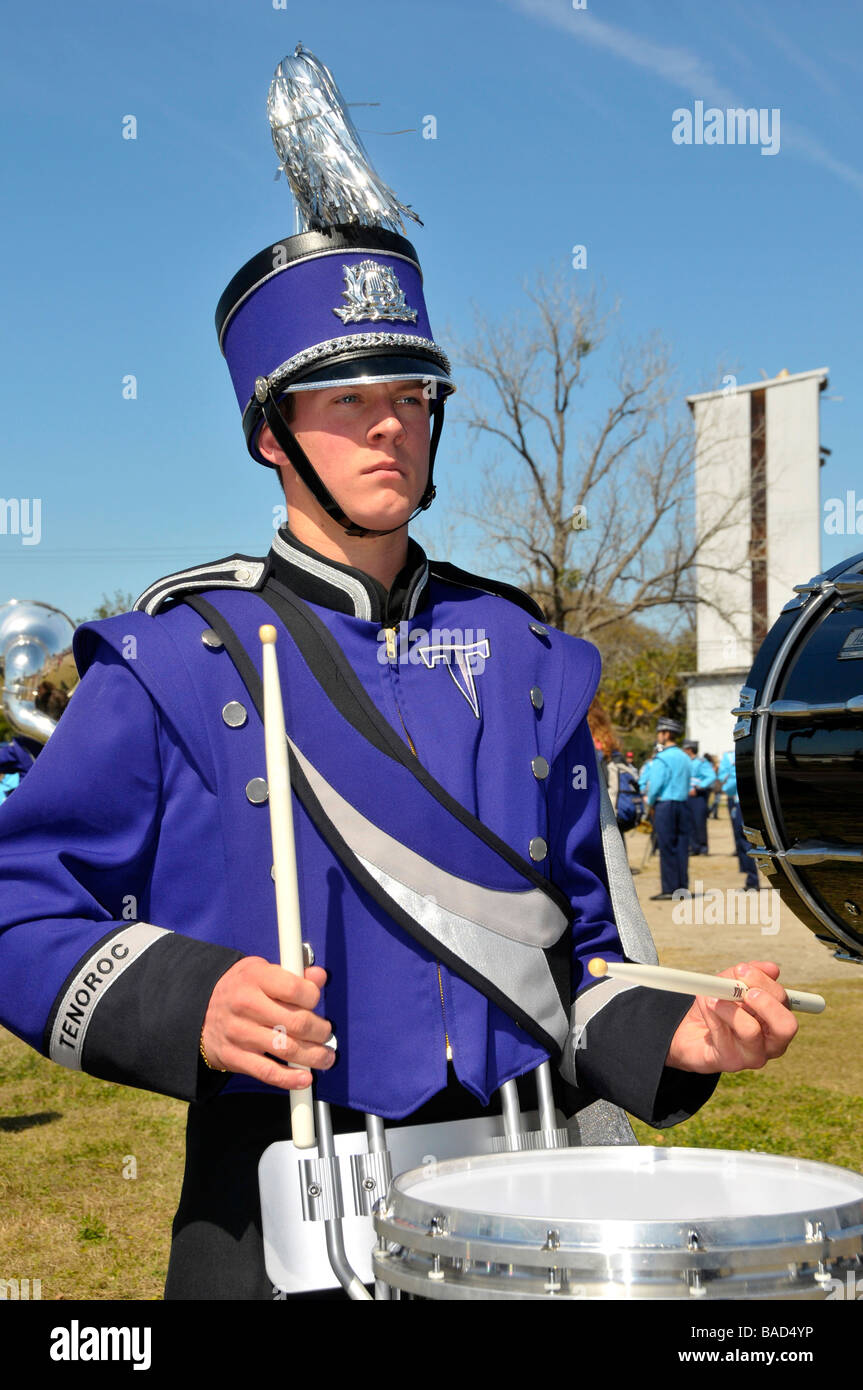 High School Band Members playing drum at Strawberry Festival Parade