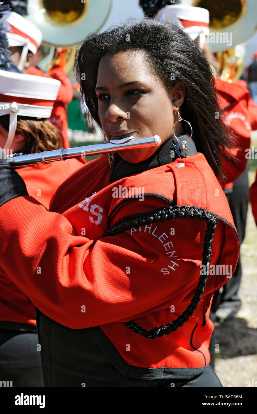 African American High School Band Member playing flute at Strawberry Festival Parade Plant City Florida Stock Photo