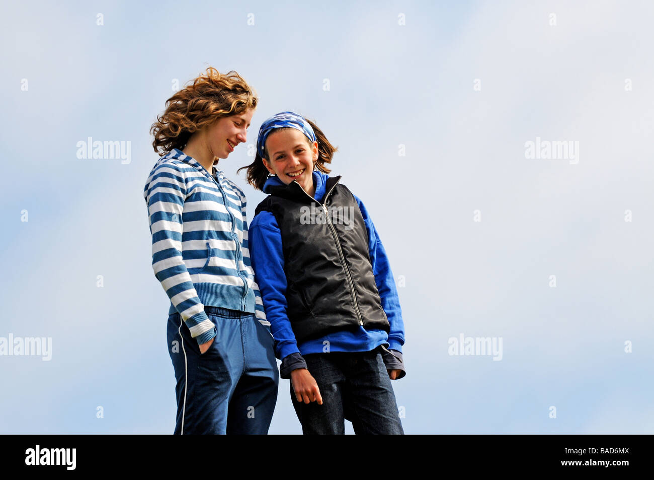outdoor portrait of two girls chatting Stock Photo