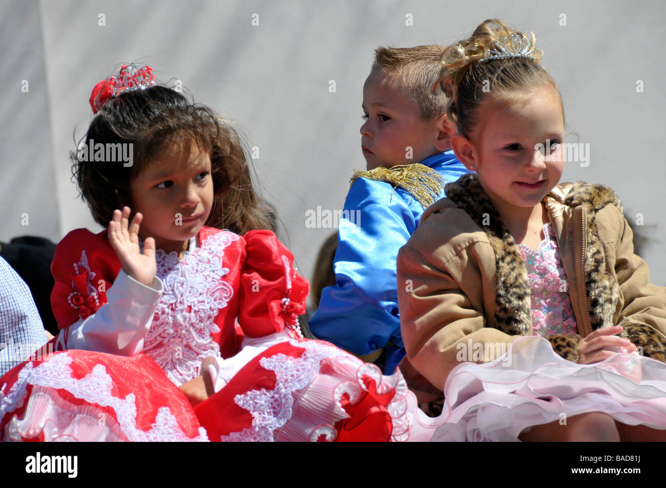 Hispanic and Caucasian Child Beauty Princesses in Strawberry Festival Parade Plant City Florida Stock Photo