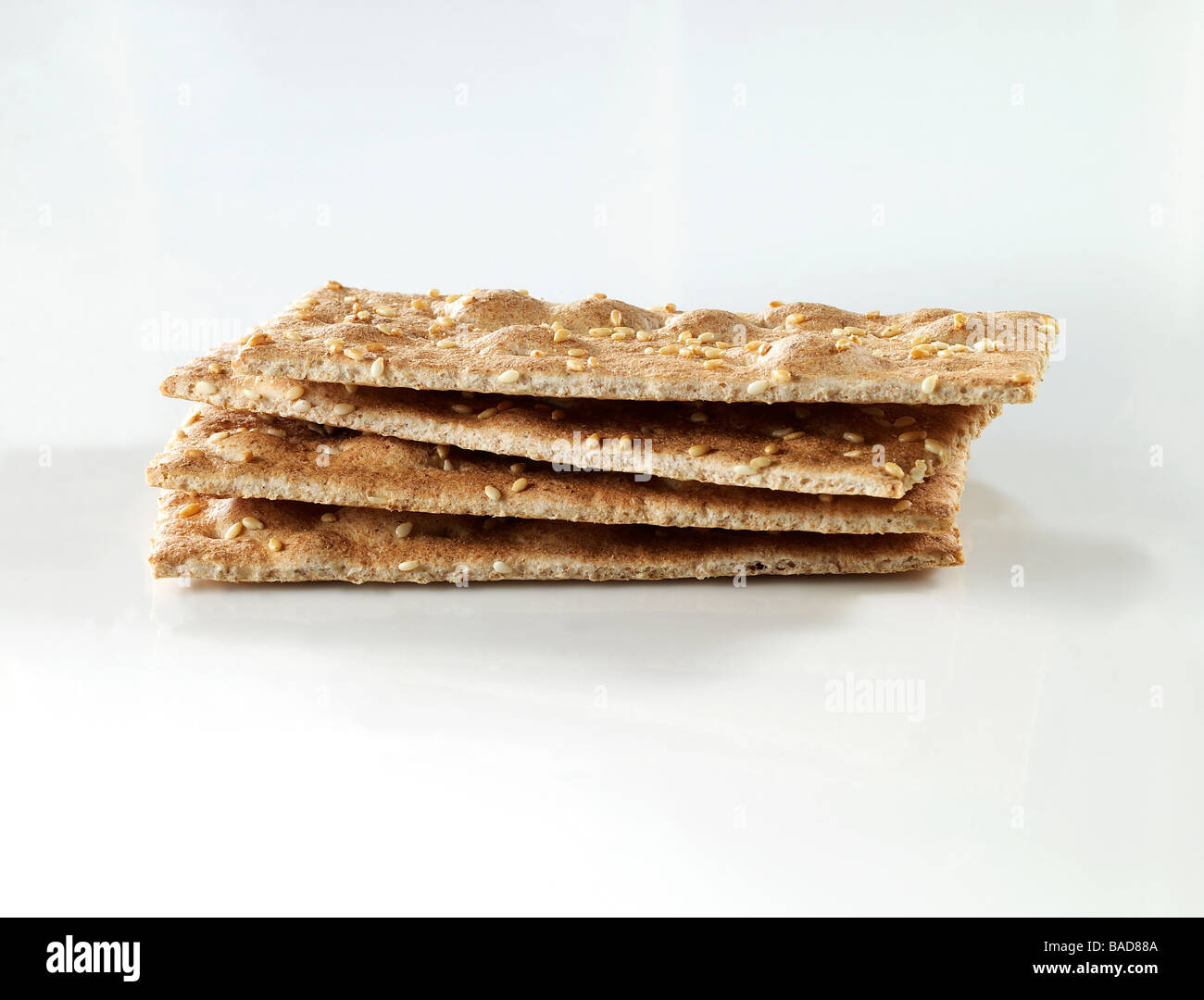 Wheat Sesame Crackers on white Stock Photo Alamy